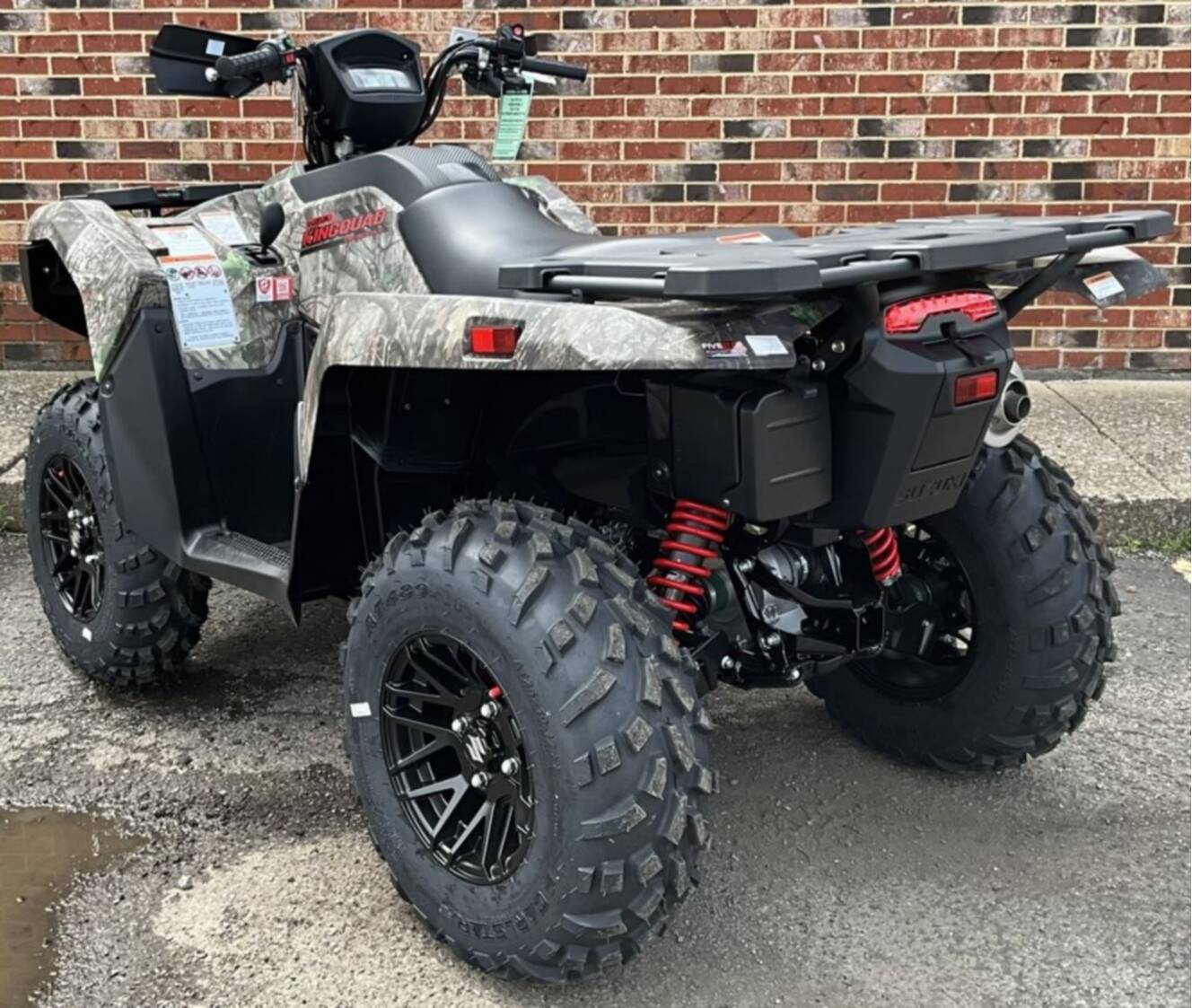 A photo of this 2026 Suzuki KingQuad 500AXi Power Steering SE Camo