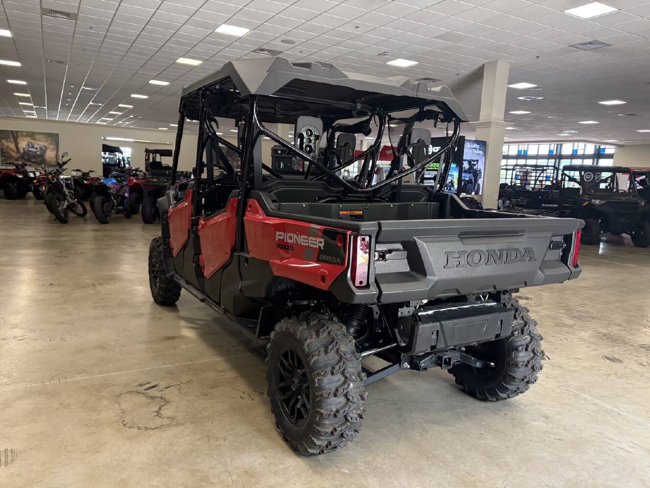 A photo of this 2025 Honda Pioneer 1000-6 Crew Deluxe
