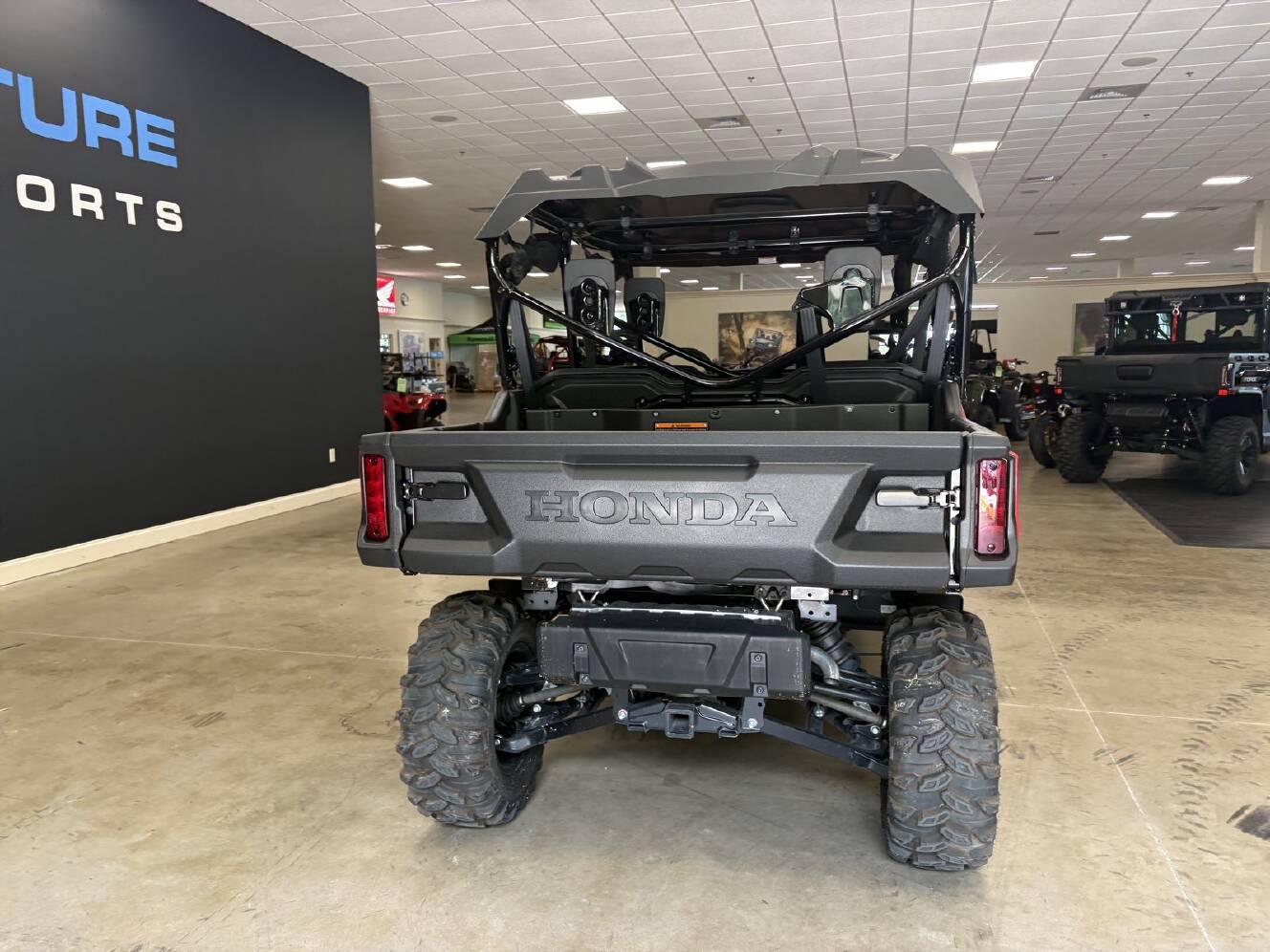 A photo of this 2025 Honda Pioneer 1000-6 Crew Deluxe