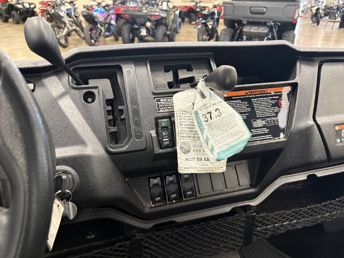 A photo of this 2025 Honda Pioneer 1000-6 Crew Deluxe