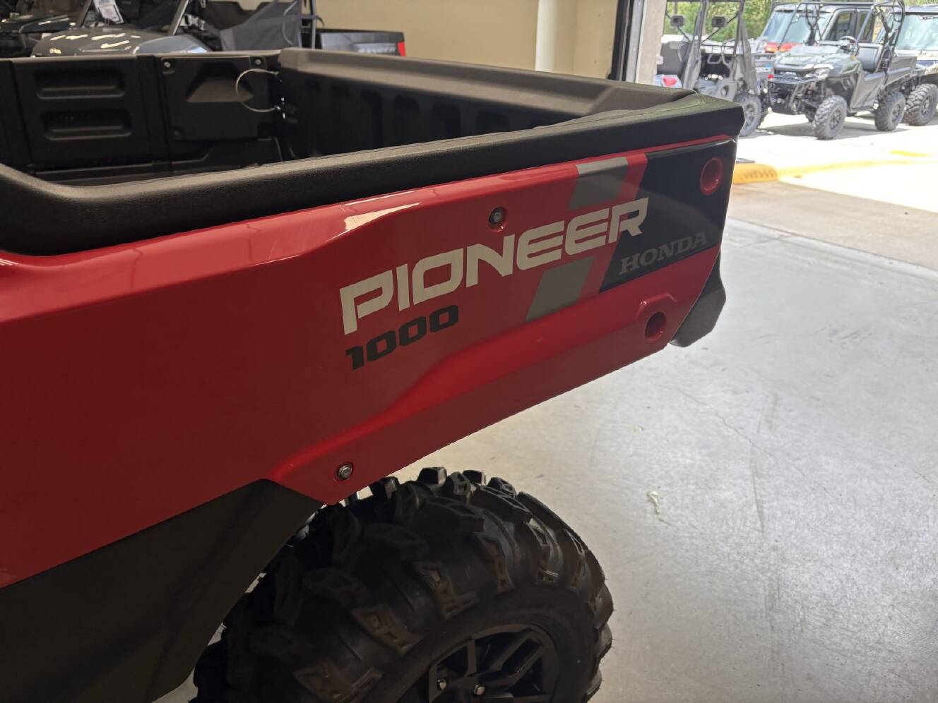 A photo of this 2025 Honda Pioneer 1000-6 Crew Deluxe
