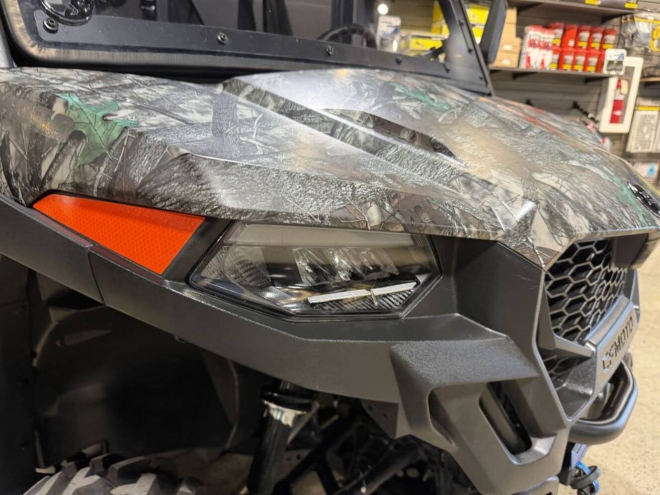 A photo of this 2025 CFMOTO UFORCE 800 XL HUNTING EDITION