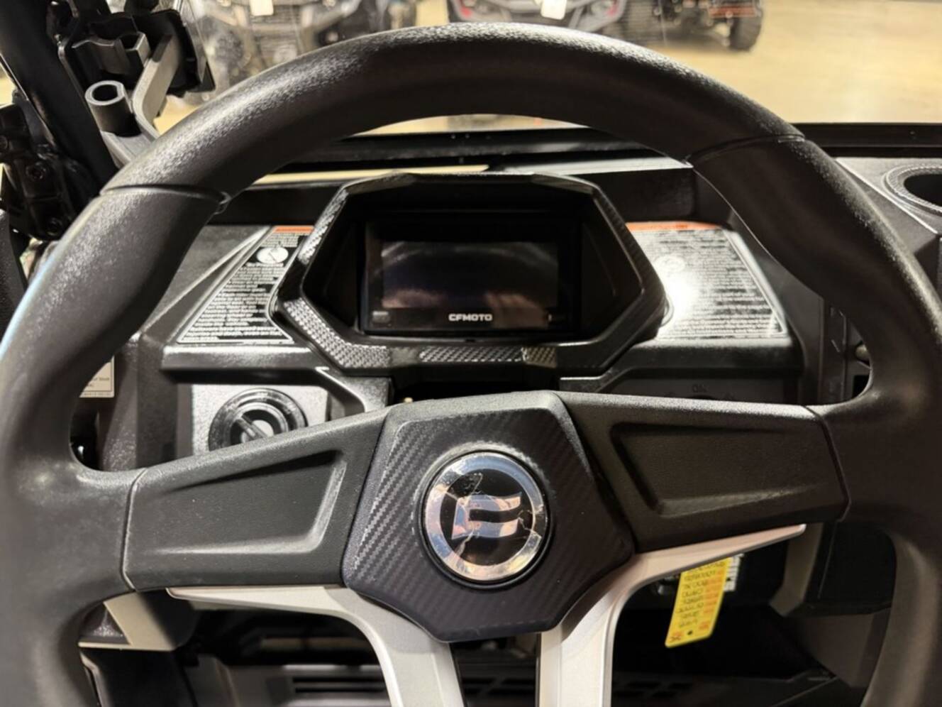 A photo of this 2025 CFMOTO UFORCE 800 XL HUNTING EDITION