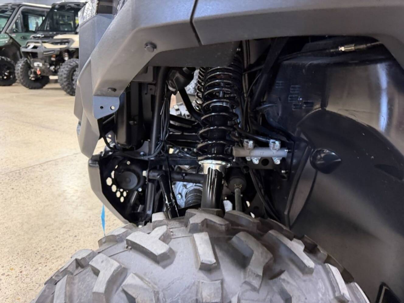 A photo of this 2025 CFMOTO UFORCE 800 XL HUNTING EDITION
