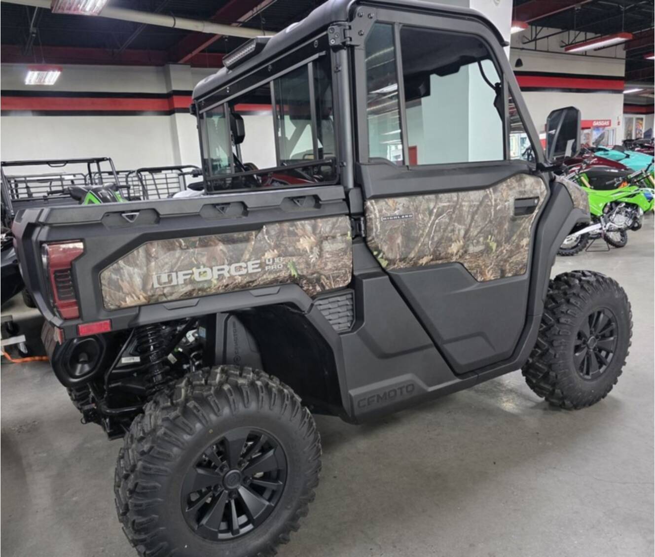 A photo of this 2027 CFMOTO UFORCE U10 Pro Highland EPS TrueTimber® Kanati Camo