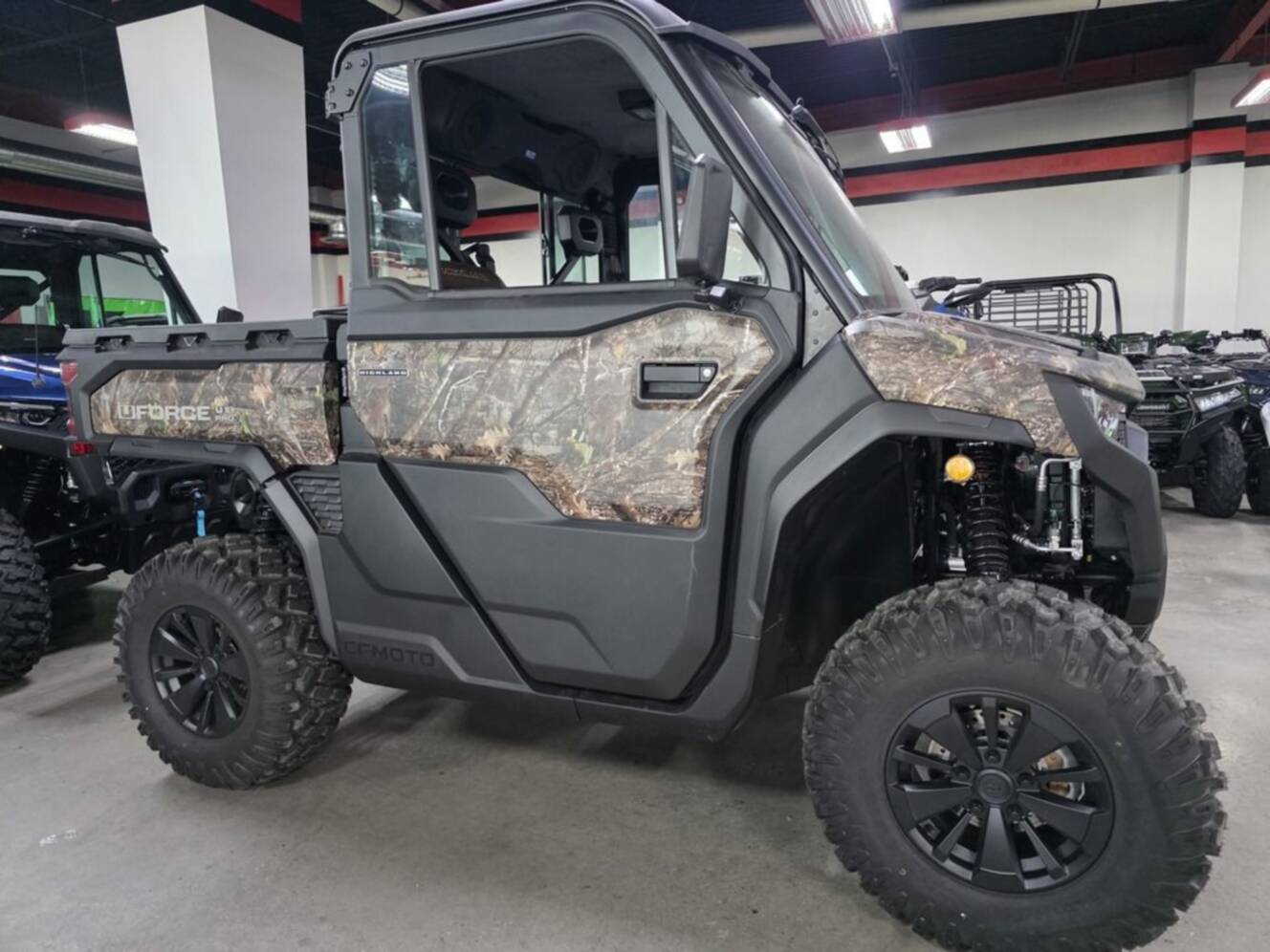 A photo of this 2027 CFMOTO UFORCE U10 Pro Highland EPS TrueTimber® Kanati Camo