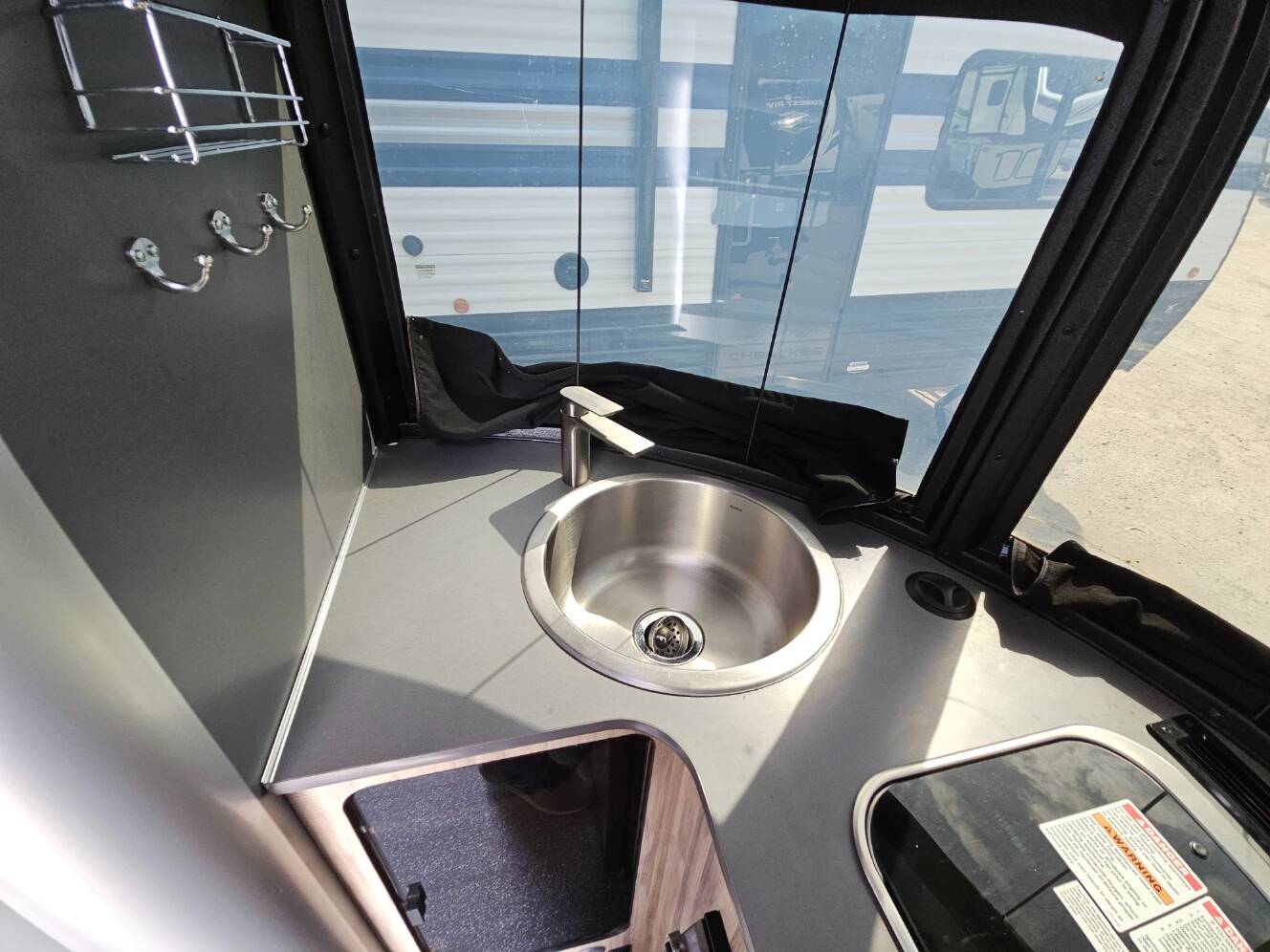 A photo of this 2023 Airstream Basecamp 16X