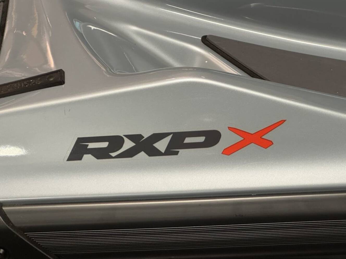 A photo of this 2026 Sea-Doo RXP-X 325 Tech, BRP Premium A, iBR Ice Metal / Manta