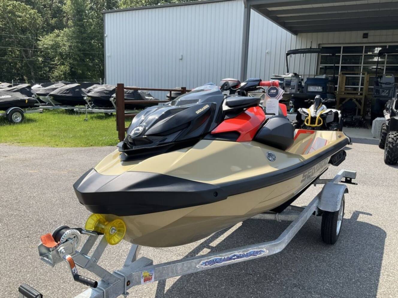 A photo of this 2025 Sea-Doo RXP-X 325 Tech, BRP Premium A, iBR Metallic Tan / La