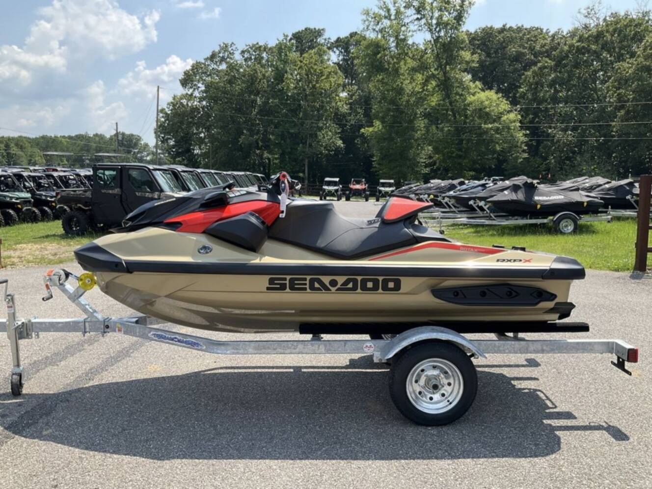 A photo of this 2025 Sea-Doo RXP-X 325 Tech, BRP Premium A, iBR Metallic Tan / La