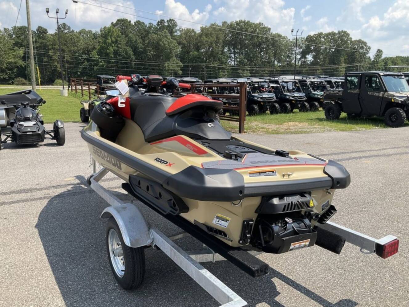 A photo of this 2025 Sea-Doo RXP-X 325 Tech, BRP Premium A, iBR Metallic Tan / La