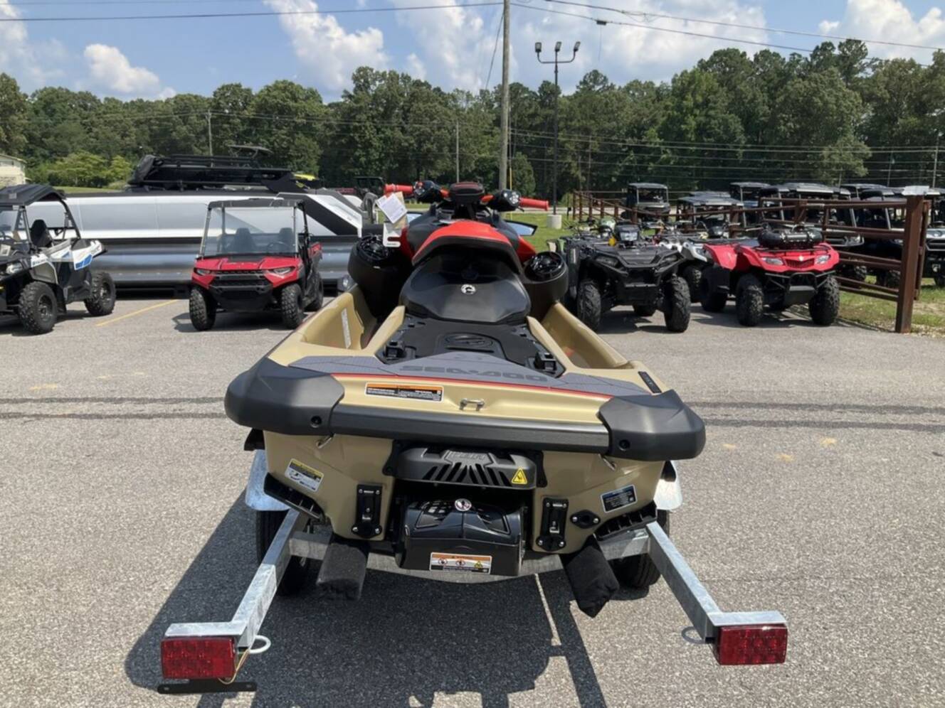 A photo of this 2025 Sea-Doo RXP-X 325 Tech, BRP Premium A, iBR Metallic Tan / La