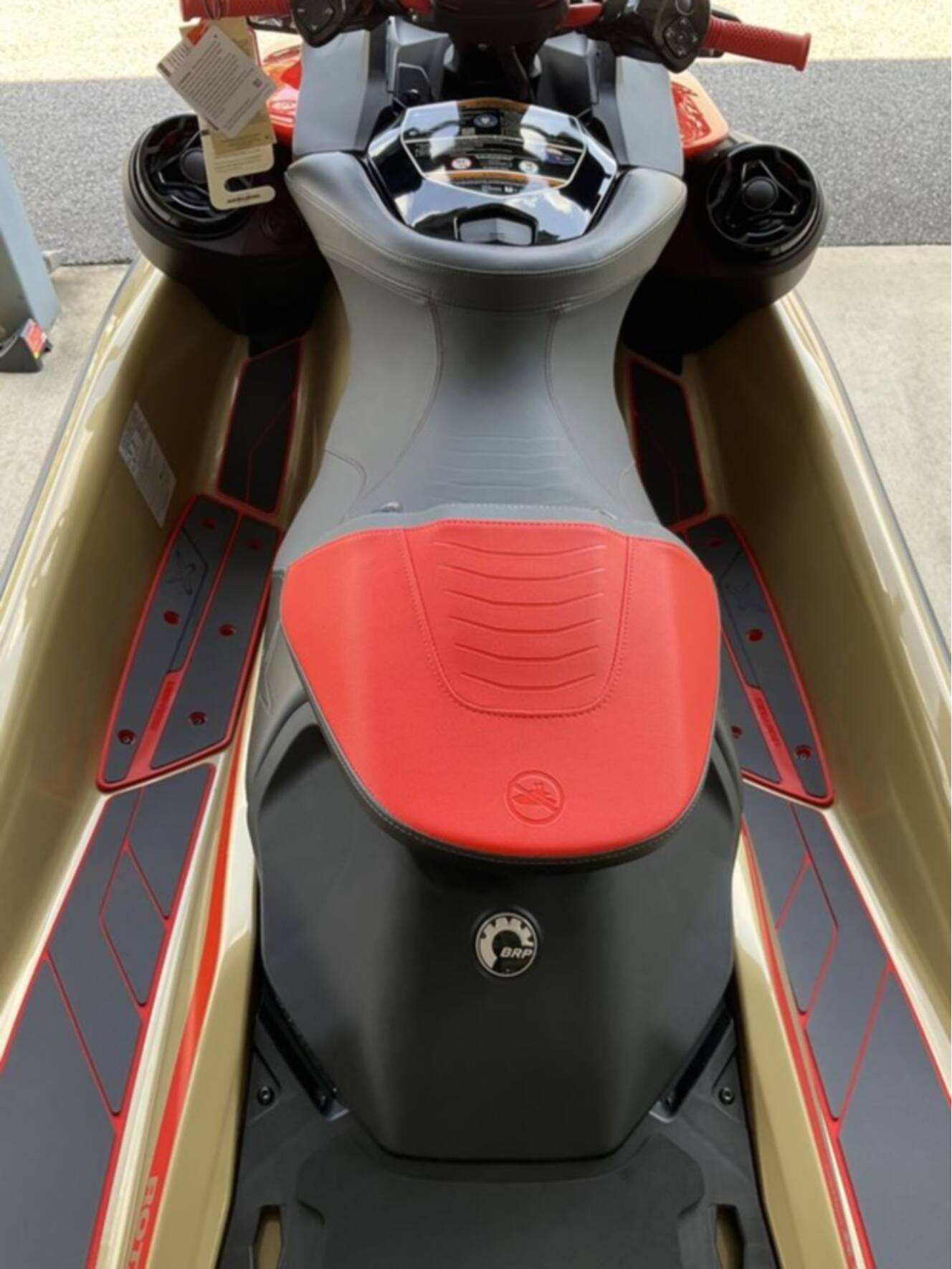 A photo of this 2025 Sea-Doo RXP-X 325 Tech, BRP Premium A, iBR Metallic Tan / La