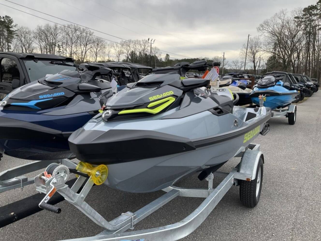 A photo of this 2026 Sea-Doo RXT-X 325 Ice Metal / Manta Green