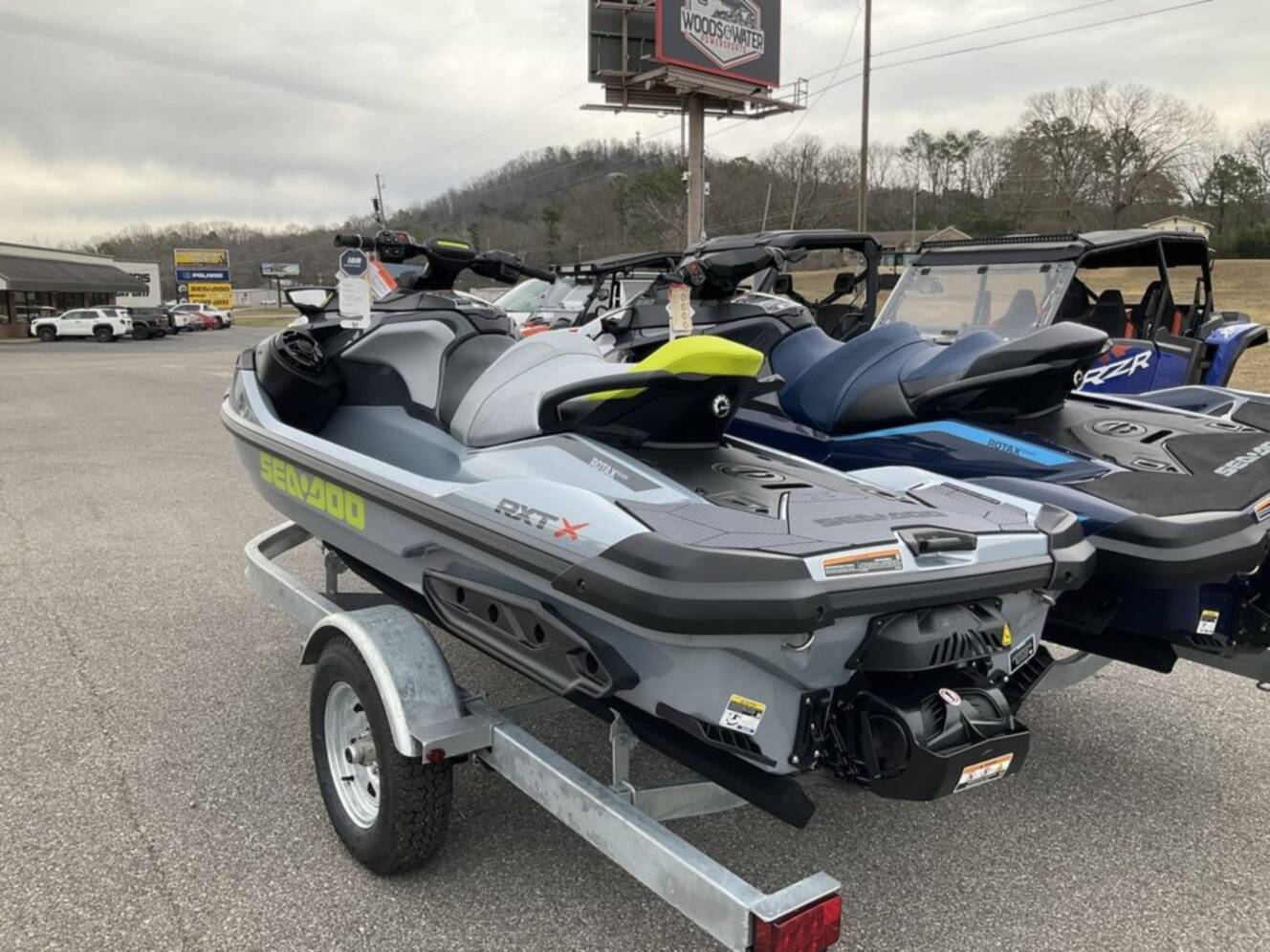 A photo of this 2026 Sea-Doo RXT-X 325 Ice Metal / Manta Green