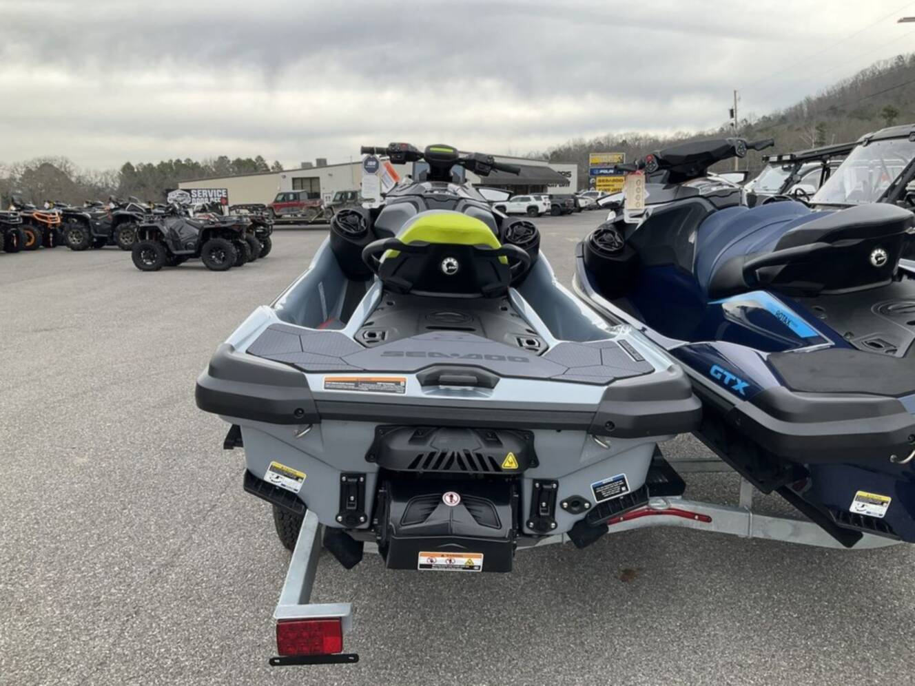 A photo of this 2026 Sea-Doo RXT-X 325 Ice Metal / Manta Green