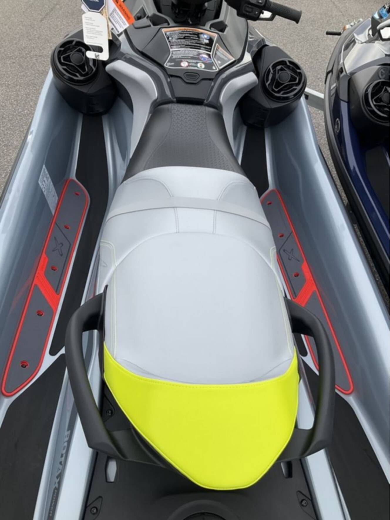 A photo of this 2026 Sea-Doo RXT-X 325 Ice Metal / Manta Green