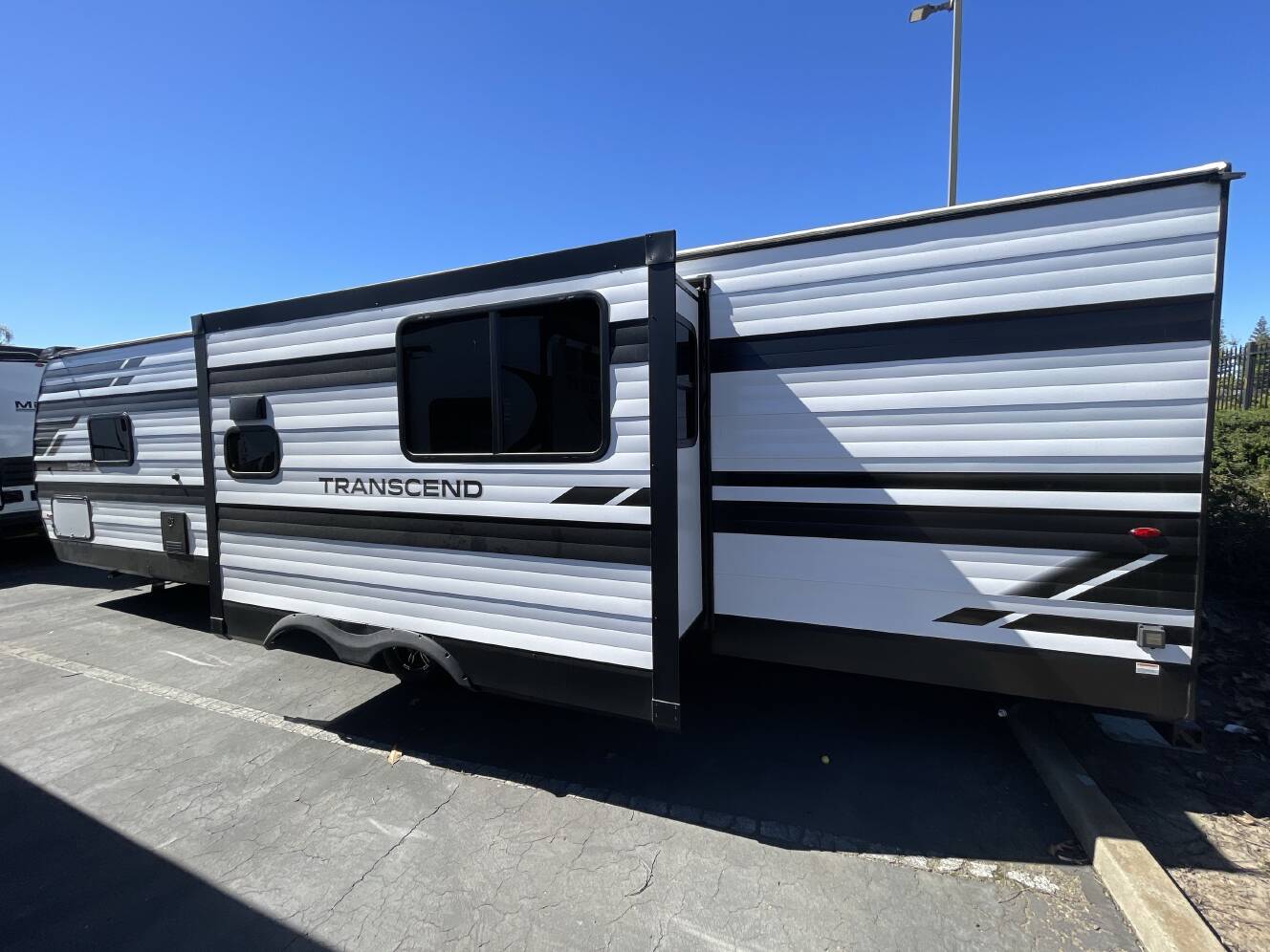 A photo of this 2025 Grand Design TRANSCEND 295QBT
