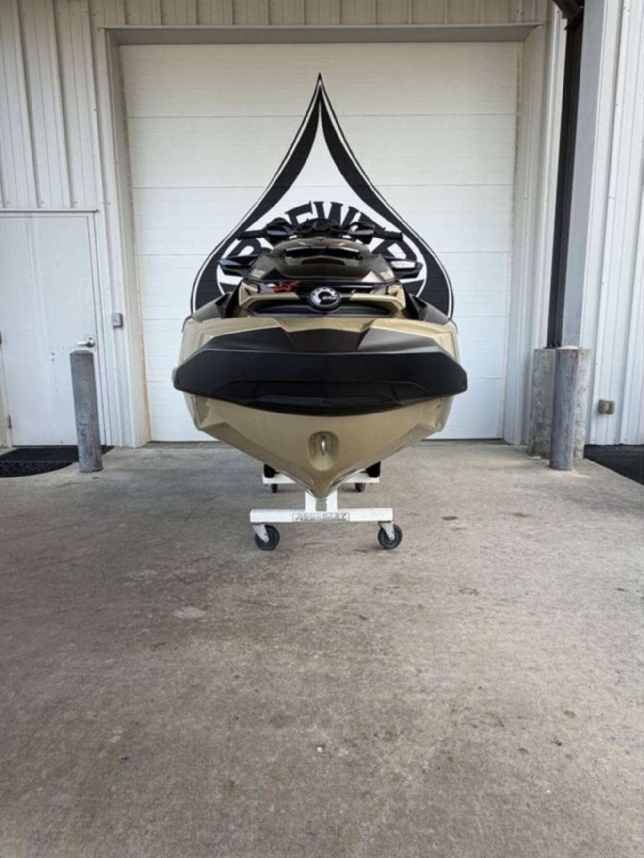 A photo of this 2025 Sea-Doo RXT-X 325 Metallic Tan / Lava Red Premium